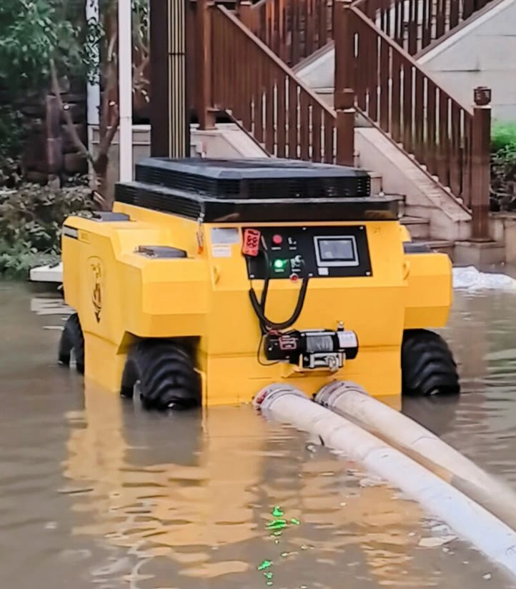 Drainage robot working in flooded water with discharge hoses connected